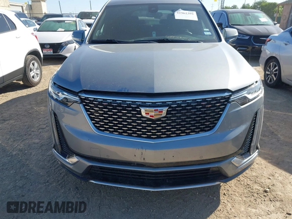 2025 Cadillac XT6 FWD Premium Luxury with VIN 1GYKPCRS3SZ118384, listed as a IAAI auction lot 41962391 with 6,946 mi miles. Bid and sale history available at carsss.com. Image 6.
