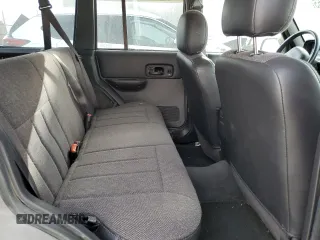 2001 Jeep Cherokee Sport z VIN 1J4FF58SX1L576572, wystawiony jako Copart lot #48982965 z przebiegiem 174 500 mil mil oraz Szkoda całkowita • Salvage title. Historia ofert i sprzedaży dostępna na DreamBid. Obrazek 11.