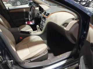 2009 Chevrolet Malibu 2LT with VIN 1G1ZJ57B494223911, listed as a IAAI auction lot 42019936 with 166,101 mi miles and . Bid and sale history available at DreamBid. Image 5.