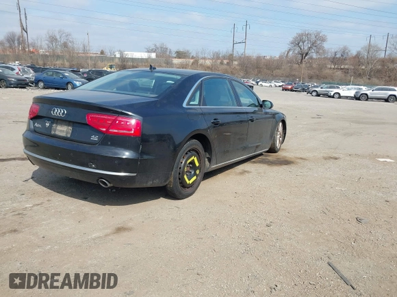 2012 Audi A8 L with VIN WAURVAFD7CN004673, listed as a IAAI auction lot 41768222 with 108,982 mi miles. Bid and sale history available at carsss.com. Image 4.