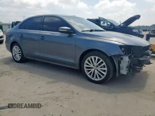 2014 Volkswagen Jetta TDI w/Premium/Nav with VIN 3VWLL7AJ7EM385112, listed as a Copart auction lot 58063295 with 169,683 mi miles and Salvage title. Bid and sale history available at DreamBid. Image 4.