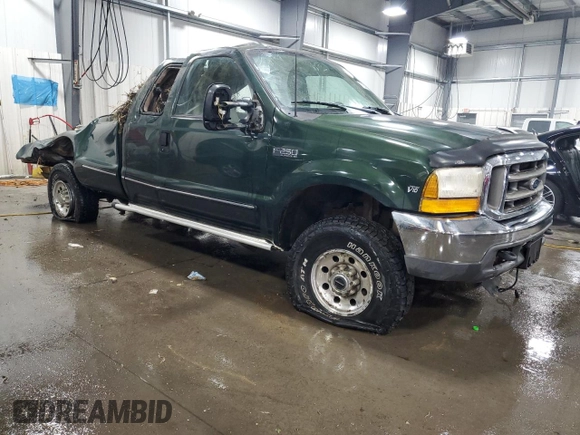 1999 Ford F-250 XL with VIN 1FTNX21S0XEA86579, listed as a Copart auction lot 71221184 with 169,104 mi miles and Non repairable. Bid and sale history available at DreamBid. Image 4.