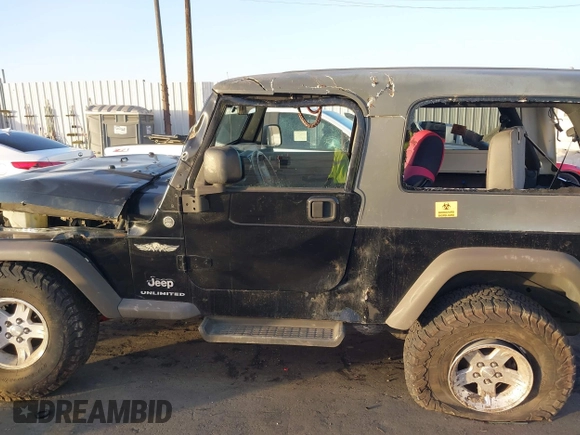 2005 Jeep Wrangler Unlimited with VIN 1J4FA44S35P314941, listed as a IAAI auction lot 41278276 with 248,865 mi miles. Bid and sale history available at carsss.com. Image 13.