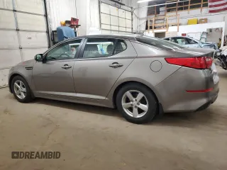2015 Kia Optima LX with VIN 5XXGM4A78FG414351, listed as a Copart auction lot 52863865 with 104,518 mi miles and Salvage Title. Bid and sale history available at carsss.com. Image 2.