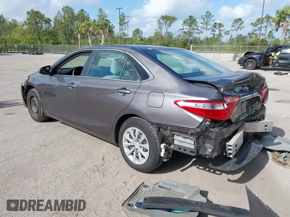 2015 Toyota Camry XLE with VIN 4T1BF1FK1FU069640, listed as a IAAI auction lot 42114496 with 67,702 mi miles and . Bid and sale history available at carsss.com. Image 3.
