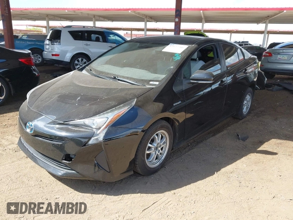 2016 Toyota Prius Two with VIN JTDKBRFUXG3503142, listed as a IAAI auction lot 42027700 with 185,319 mi miles. Bid and sale history available at carsss.com. Image 2.