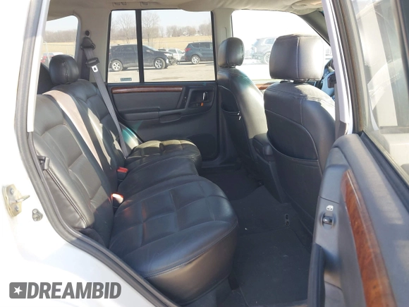 1997 Jeep Grand Cherokee Limited with VIN 1J4GZ78Y8VC769675, listed as a IAAI auction lot 41694347 with 113,834 mi miles. Bid and sale history available at carsss.com. Image 8.