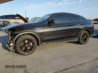 2021 BMW X4 xDrive30i with VIN 5UX2V1C01M9F43128, listed as a Copart auction lot 60580403 with 32,151 mi miles. Bid and sale history available at carsss.com. Image 1.
