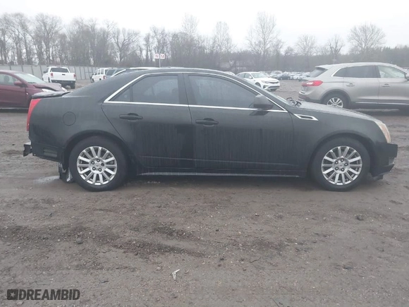 2011 Cadillac CTS Sedan with VIN 1G6DA5EY5B0102006, listed as a IAAI auction lot 41463229 with 134,336 mi miles. Bid and sale history available at carsss.com. Image 13.