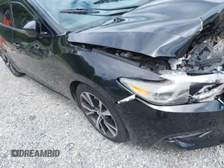 2017 Nissan Maxima SL with VIN 1N4AA6AP9HC385851, listed as a IAAI auction lot 42486634 with 98,599 mi miles and . Bid and sale history available at DreamBid. Image 18.