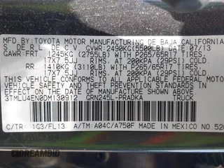 2013 Toyota Tacoma with VIN 3TMLU4EN0DM130912, listed as a IAAI auction lot 42682150 with 166,503 mi miles and . Bid and sale history available at DreamBid. Image 9.