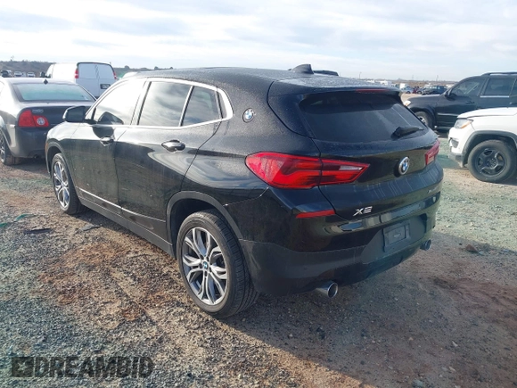 2020 BMW X2 xDrive28i with VIN WBXYJ1C02L5P31038, listed as a IAAI auction lot 41338219 with 72,854 mi miles. Bid and sale history available at carsss.com. Image 3.
