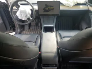 2023 Tesla Model Y Long Range z VIN 7SAYGDEE2PA041350, wystawiony jako Copart lot #56657005 z przebiegiem 25 090 mil mil oraz Szkoda całkowita • Salvage title. Historia ofert i sprzedaży dostępna na DreamBid. Obrazek 8.