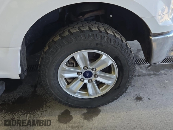 2018 Ford F-150 XL with VIN 1FTFX1E50JKD73903, listed as a IAAI auction lot 42663576 with 178,136 mi miles and . Bid and sale history available at DreamBid. Image 13.