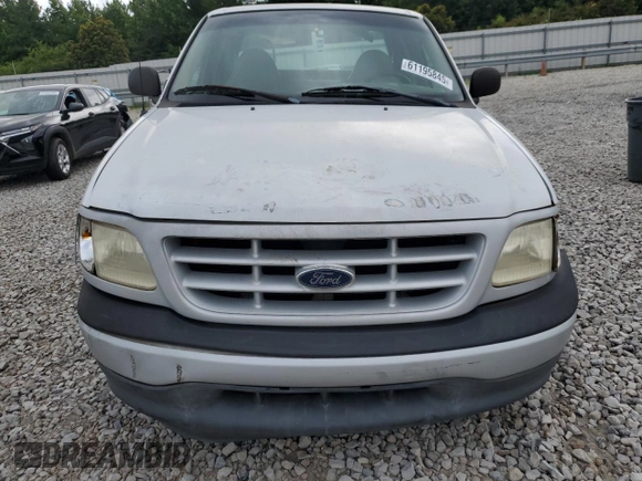 1999 Ford F-150 with VIN 1FTZX1728XNA67734, listed as a Copart auction lot 61195845 with Not provided miles and Salvage title. Bid and sale history available at DreamBid. Image 5.