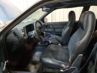 1989 Chevrolet Cavalier with VIN 1G1JC1113KJ278292, listed as a Copart auction lot 44942375 with 85,604 mi miles and Salvage Title. Bid and sale history available at DreamBid. Image 7.