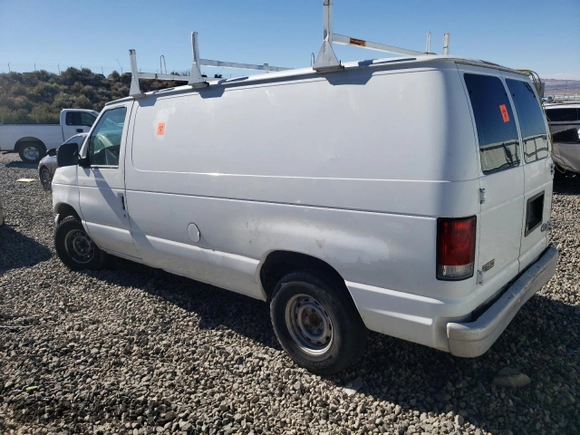 1999 Ford Econoline Cargo with VIN 1FTRE142XXHB29496, listed as a Copart auction lot 64516444 with 206,951 mi miles and Salvage Title. Bid and sale history available at carsss.com. Image 2.