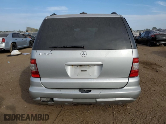 2003 Mercedes-Benz M-Class 3.7L with VIN 4JGAB57E33A421993, listed as a Copart auction lot 71800334 with 210,086 mi miles and Salvage Title. Bid and sale history available at carsss.com. Image 6.