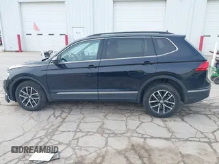 2021 Volkswagen Tiguan SE with VIN 3VV2B7AXXMM057849, listed as a IAAI auction lot 41879768 with 88,353 mi miles and . Bid and sale history available at DreamBid. Image 14.