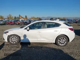 2015 Mazda 3 i Touring with VIN JM1BM1L78F1236829, listed as a IAAI auction lot 40791207 with 87,454 mi miles and . Bid and sale history available at carsss.com. Image 14.