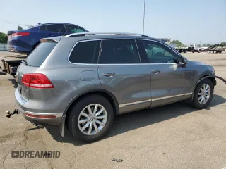 2015 Volkswagen Touareg Lux с VIN WVGEP9BP2FD004595, выставлен на аукционе Copart как лот 59020375 с пробегом 135 319 миль миль и Списание • Salvage title. История ставок и продаж доступна на DreamBid. Изображение 3.