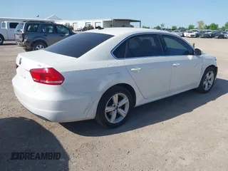 2015 Volkswagen Passat 1.8T Limited Edition with VIN 1VWAT7A34FC085880, listed as a IAAI auction lot 42007677 with 184,722 mi miles. Bid and sale history available at carsss.com. Image 4.
