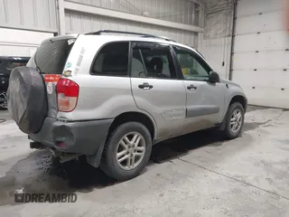 2001 Toyota RAV4 with VIN JTEHH20V210071023, listed as a IAAI auction lot 42173524 with 190,103 mi miles and . Bid and sale history available at DreamBid. Image 4.