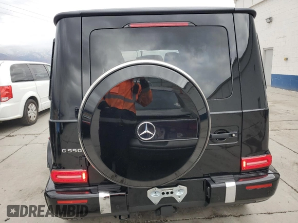 2023 Mercedes-Benz G 550 with VIN W1NYC6BJ0PX476536, listed as a Copart auction lot 79498634 with 17,674 mi miles and Salvage Title. Bid and sale history available at DreamBid. Image 6.
