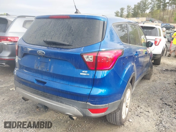 2019 Ford Escape SE z VIN 1FMCU9GD5KUA06575, wystawiony jako IAAI lot #41942726 z przebiegiem 85 290 mil mil oraz . Historia ofert i sprzedaży dostępna na DreamBid. Obrazek 4.
