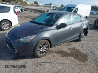 2019 Toyota Yaris Sedan L with VIN 3MYDLBYVXKY506966, listed as a IAAI auction lot 41455800 with 106,284 mi miles. Bid and sale history available at carsss.com. Image 19.