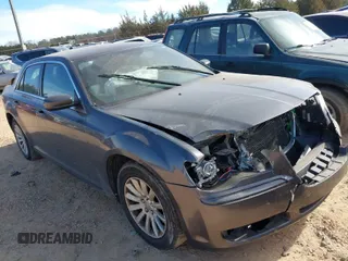 2014 Chrysler 300 with VIN 2C3CCAAG7EH372948, listed as a IAAI auction lot 41459922 with 220,930 mi miles. Bid and sale history available at carsss.com. Image 1.