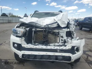 2018 Toyota Tacoma SR with VIN 5TFCZ5AN3JX128204, listed as a Copart auction lot 53970865 with 76,986 mi miles and Salvage Title. Bid and sale history available at DreamBid. Image 5.