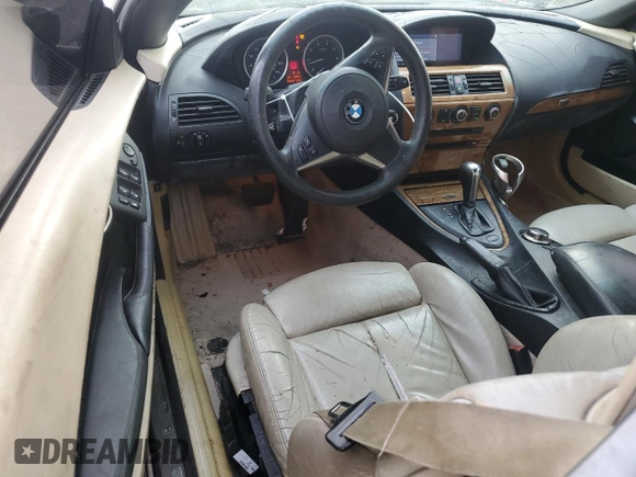 2007 BMW 6 Series 650i z VIN WBAEK13527CN83125, wystawiony jako Copart lot #79381004 z przebiegiem 140 844 mil mil oraz Szkoda całkowita • Salvage title. Historia ofert i sprzedaży dostępna na DreamBid. Obrazek 8.