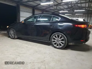 2019 Mazda 3 Premium with VIN 3MZBPAEM7KM102348, listed as a Copart auction lot 84587534 with 73,125 mi miles and Salvage Title. Bid and sale history available at DreamBid. Image 2.