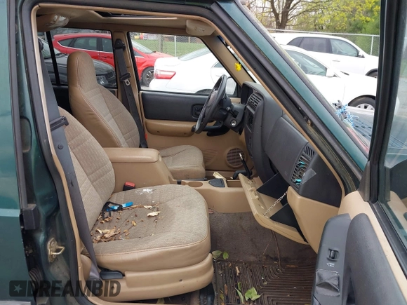 2001 Jeep Cherokee Sport with VIN 1J4FF48S51L561438, listed as a IAAI auction lot 41965207 with 222,868 mi miles and . Bid and sale history available at DreamBid. Image 5.