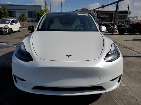 2024 Tesla Model Y Long Range with VIN 7SAYGDEE2RF090540, listed as a Copart auction lot 56684505 with 18,261 mi miles and Salvage title. Bid and sale history available at DreamBid. Image 5.