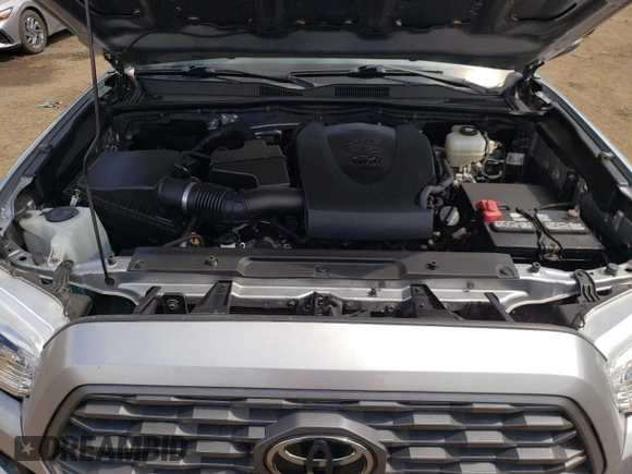 2021 Toyota Tacoma SR z VIN 5TFCZ5AN7MX272231, wystawiony jako Copart lot #52739255 z przebiegiem 67 414 mil mil oraz Szkoda całkowita • Salvage title. Historia ofert i sprzedaży dostępna na DreamBid. Obrazek 11.
