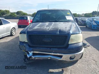 2006 Ford F-150 XL with VIN 1FTPX12V06NB79290, listed as a IAAI auction lot 41176379 with 205,938 mi miles. Bid and sale history available at carsss.com. Image 12.