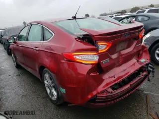 2015 Ford Fusion Energi Titanium with VIN 3FA6P0SU4FR281790, listed as a Copart auction lot 69246692 with 129,108 mi miles. Bid and sale history available at carsss.com. Image 2.