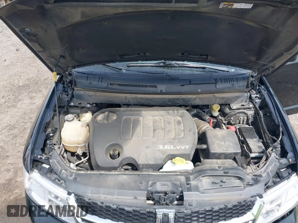 2014 Dodge Journey SXT with VIN 3C4PDCBG2ET262014, listed as a IAAI auction lot 41898343 with 199,732 mi miles. Bid and sale history available at carsss.com. Image 10.