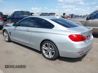 2015 BMW 4 Series 428i with VIN WBA3N7C54FK225045, listed as a IAAI auction lot 42042980 with 72,909 mi miles. Bid and sale history available at carsss.com. Image 3.