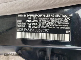 2000 Mercedes-Benz E-Class with VIN WDBJF65J5YB068297, listed as a Copart auction lot 69199004 with 236,751 mi miles and Salvage Title. Bid and sale history available at carsss.com. Image 14.