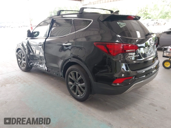 2018 Hyundai Santa Fe Ultimate z VIN 5NMZW4LA6JH054308, wystawiony jako IAAI lot #42385503 z przebiegiem 108 004 mil mil oraz . Historia ofert i sprzedaży dostępna na DreamBid. Obrazek 3.