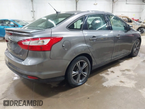 2014 Ford Focus SE with VIN 1FADP3F24EL310431, listed as a IAAI auction lot 41997295 with 108,718 mi miles. Bid and sale history available at carsss.com. Image 4.