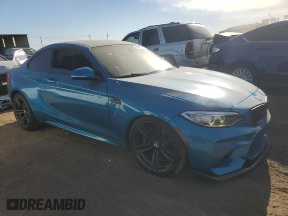 2016 BMW M2 with VIN WBS1H9C52GV351930, listed as a Copart auction lot 86610764 with 55,473 mi miles and Salvage Title. Bid and sale history available at carsss.com. Image 4.