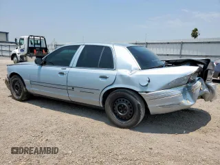 2004 Ford Crown Victoria LX z VIN 2FAFP74W54X184815, wystawiony jako Copart lot #57280725 z przebiegiem 294 513 mil mil oraz Szkoda całkowita • Salvage title. Historia ofert i sprzedaży dostępna na DreamBid. Obrazek 2.