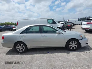 2005 Toyota Camry LE with VIN 4T1BF30KX5U088710, listed as a IAAI auction lot 42113518 with 182,277 mi miles and . Bid and sale history available at DreamBid. Image 13.