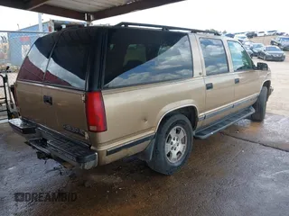1999 Chevrolet Suburban with VIN 1GNFK16RXXJ416360, listed as a IAAI auction lot 42670294 with 319,691 mi miles and . Bid and sale history available at DreamBid. Image 4.