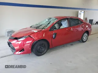 2019 Toyota Corolla L z VIN 5YFBURHE0KP861219, wystawiony jako Copart lot #59435715 z przebiegiem Nie podano mil oraz Szkoda całkowita • Salvage title. Historia ofert i sprzedaży dostępna na DreamBid. Obrazek 1.