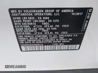 2018 Volkswagen Atlas S with VIN 1V2AP2CAXJC532712, listed as a IAAI auction lot 41177882 with 105,832 mi miles and . Bid and sale history available at DreamBid. Image 9.